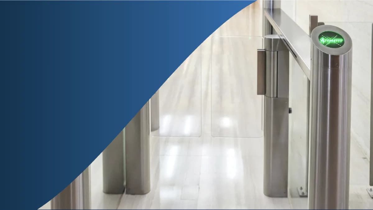 A regulated facility reception with a self-check-in visitor kiosk, MRZ passport scanner, camera and badge printer, plus a security officer verifying credentials at the console.